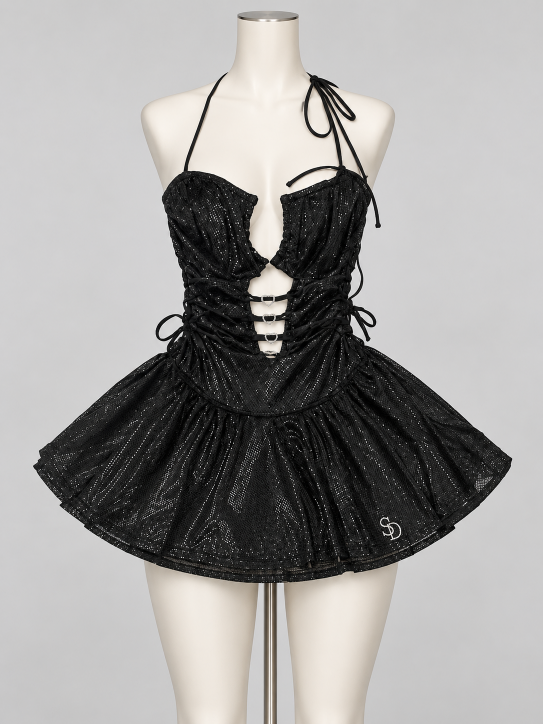 Fairytale Mesh Romper Black on an ivory display mannequin; AI-generated styling visualization. Original product photos retained for reference.