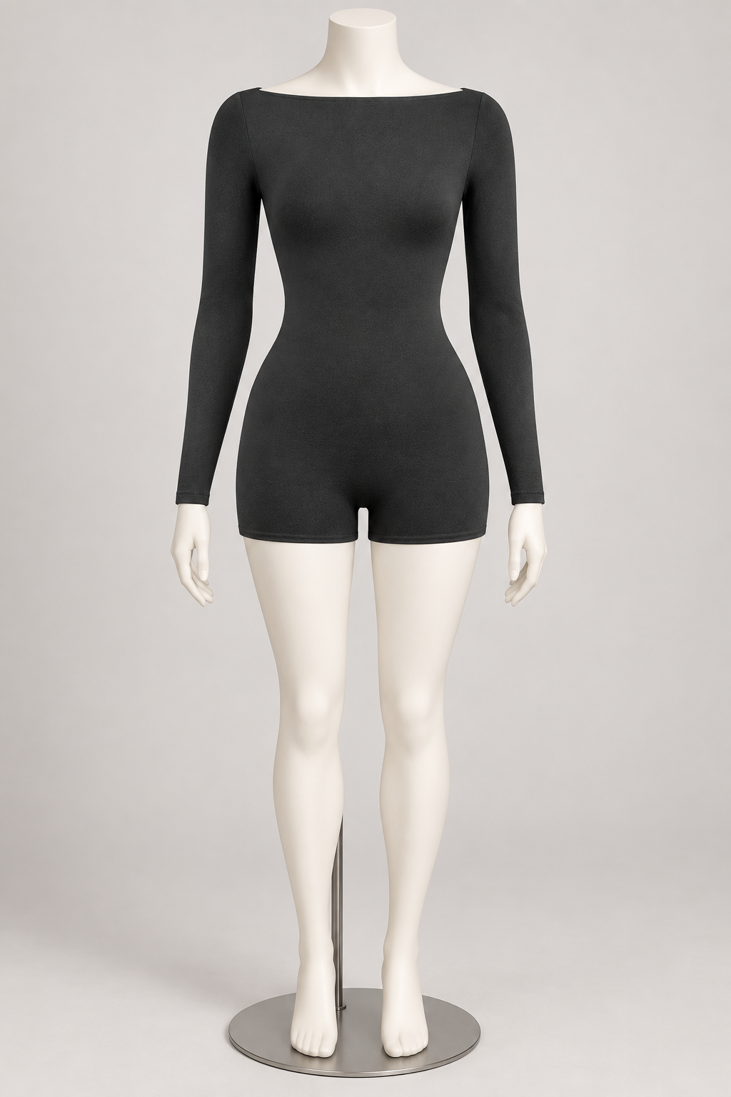 Feels So Good Romper Black on an ivory display mannequin; AI-generated styling visualization. Original product photos retained for reference.