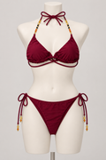 Golden Hour Bikini Burgundy (No promo) on a display mannequin; AI-generated styling visualization. Original product photos retained for reference.