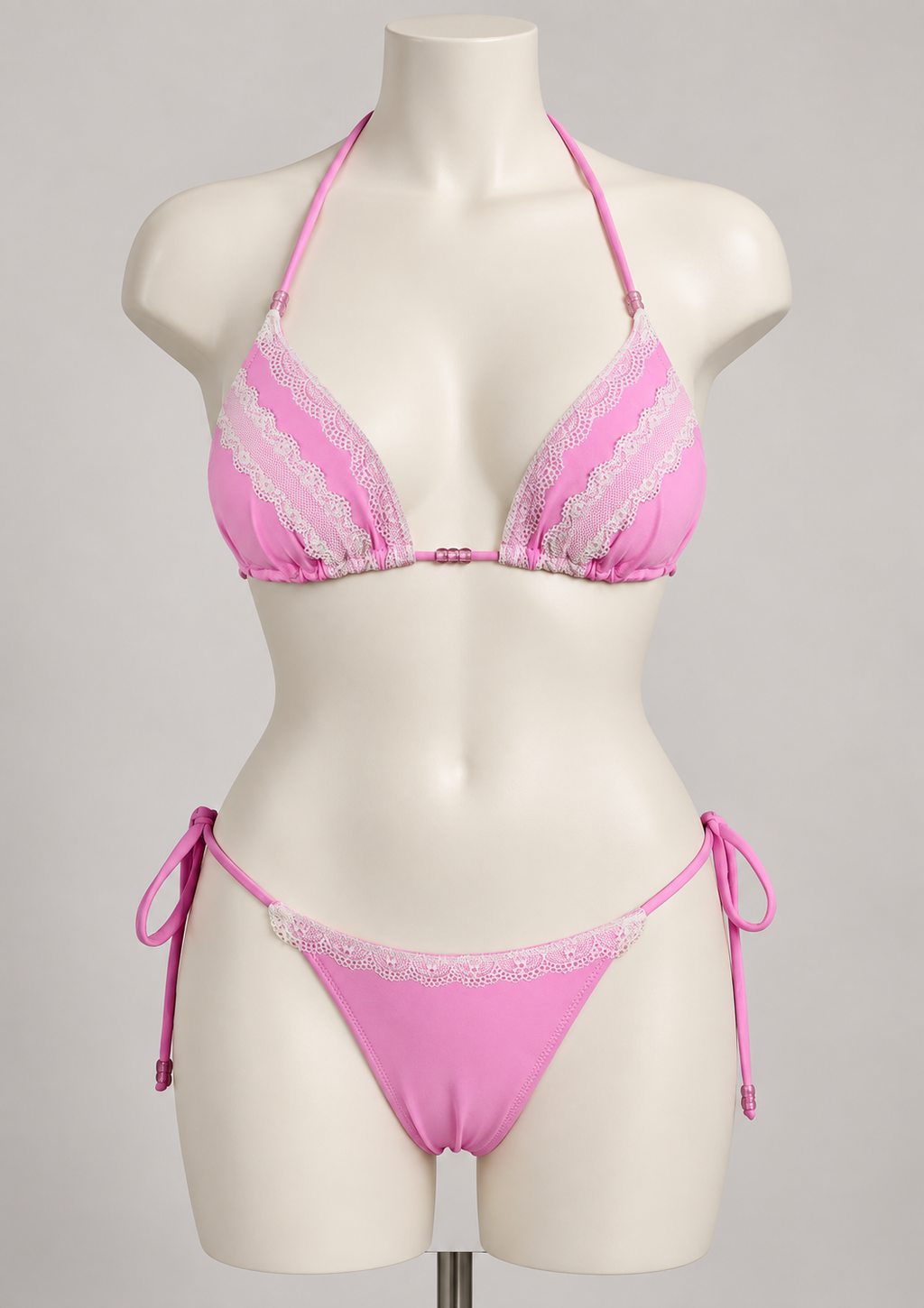 Pink Lace Bikini on an ivory display mannequin; AI-generated styling visualization. Original product photos retained for reference.