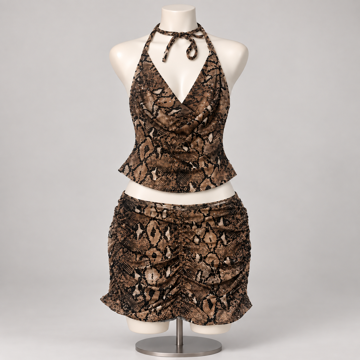 Real WIld One Mesh Set Snake Print (No Promo) on an ivory display mannequin; AI-generated styling visualization. Original product photos retained for reference.