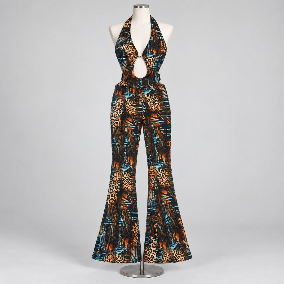 Vixen Charm Jumpsuit Print on an ivory display mannequin; AI-generated styling visualization. Original product photos retained for reference.